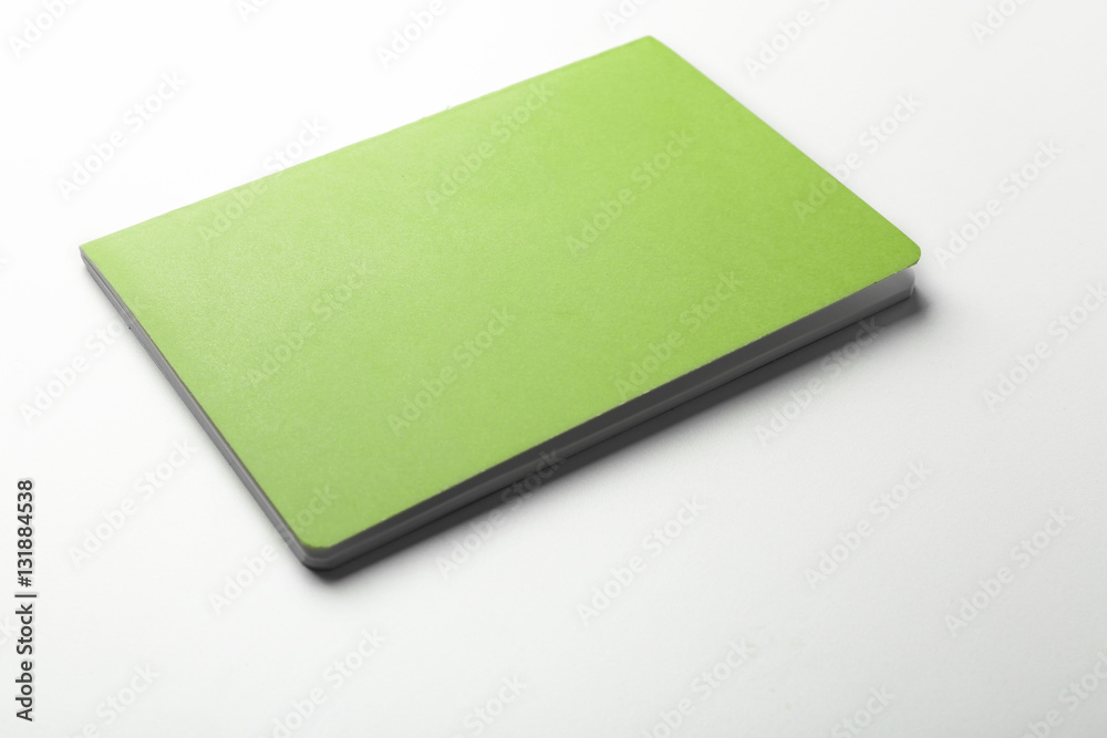 Blank green notebook on white background Blank green notebook on white background