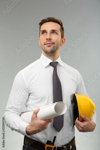 Handsome engineer with draw...