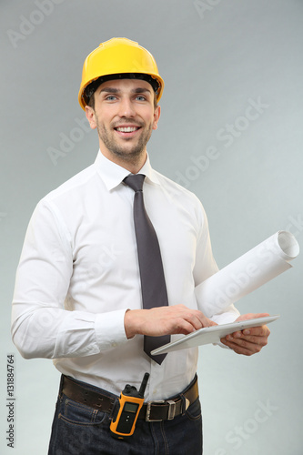 Handsome engineer with draw...