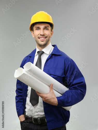 Handsome engineer with draw...
