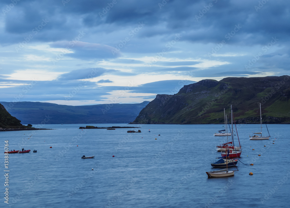 UK, Scotland, Highlands, Isle of Skye, Twilight view of the Loch Portree. UK, Scotland, Highlands, Isle of Skye, Twilight view of the Loch Portree.