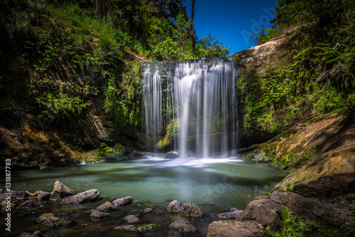 Long Exposure of Oakley Creek Waterfall on a bright Summers Day  Auckland  New Zealand