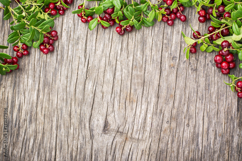 Cranberry. Berry with leaves. Food background.