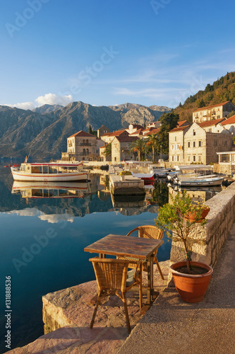 Embankment of Perast town on a sunny winter day. Bay of Kotor, Montenegro photo
