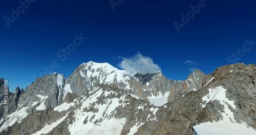 Panoramic view of Western alps whith Mount Blanc and Giant's Tooth (Dent du Geant) from Helbronner roof of europe in Aosta Valley region of Italy
