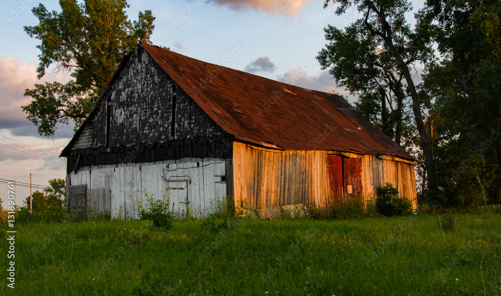 Old barn with trees at sunset Old barn with trees at sunset