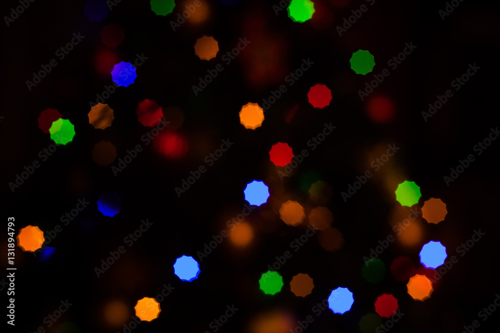 Obraz premium Christmas Background with defocused lights of a fir tree
