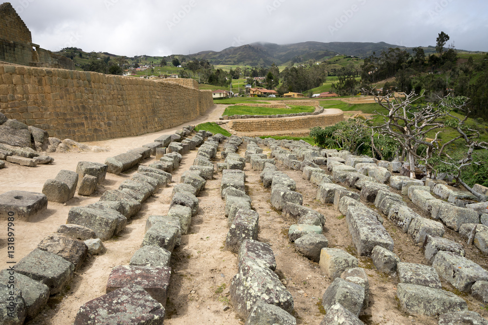 recoverred ancient stone blocks from the surrounding villages which ...
