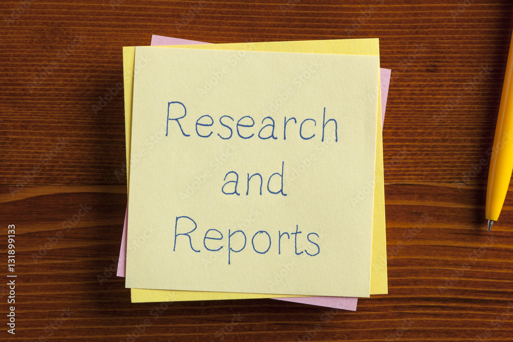 Research and Reports written on a note Research and Reports written on a note