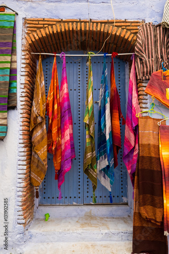 Africa, Morocco, Chefchaouen or Chaouen  is the chief town of the province of the same name. Display of colorful scarves. © Emily_M_Wilson