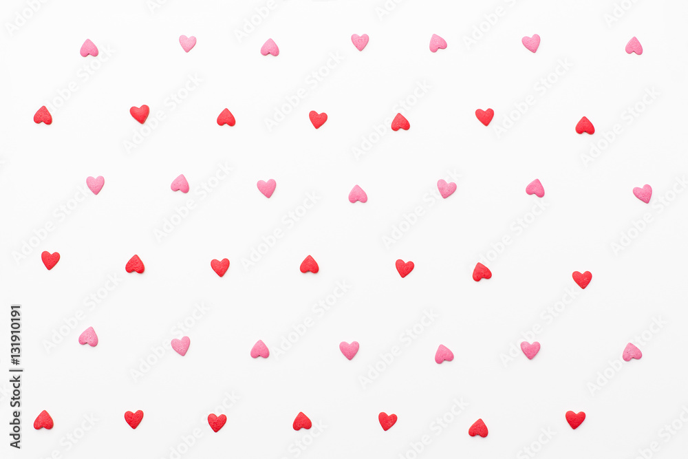 background of many small red and pink hearts. Festive background for Valentine's day, birthday, wedding, holiday, postcard, party