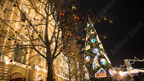 Christmas center of Moscow. Christmas fair at Red Square and Saint Basil's Cathedral in Moscow in the evening © gal2007