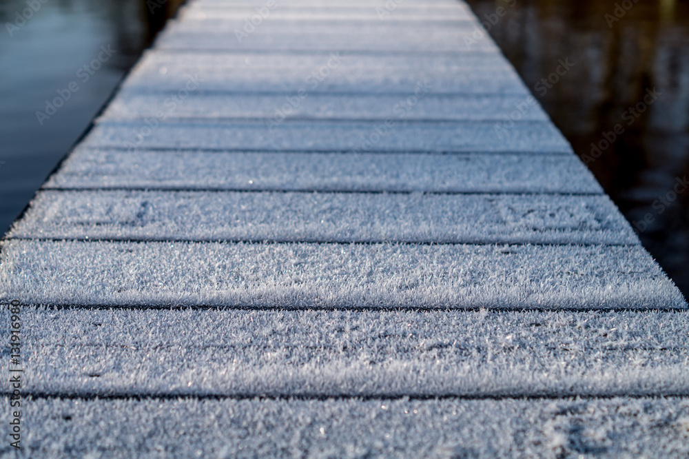 Obraz premium detail, closeup of a frozen boating dock