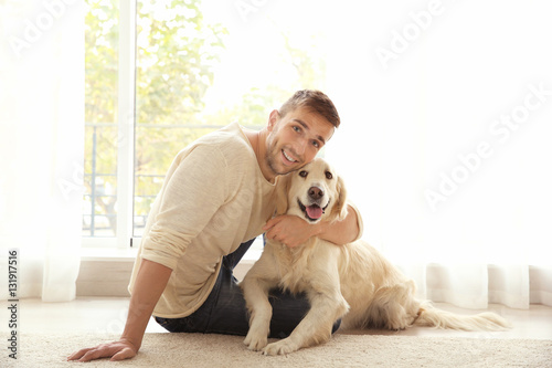 Handsome man with cute dog ...