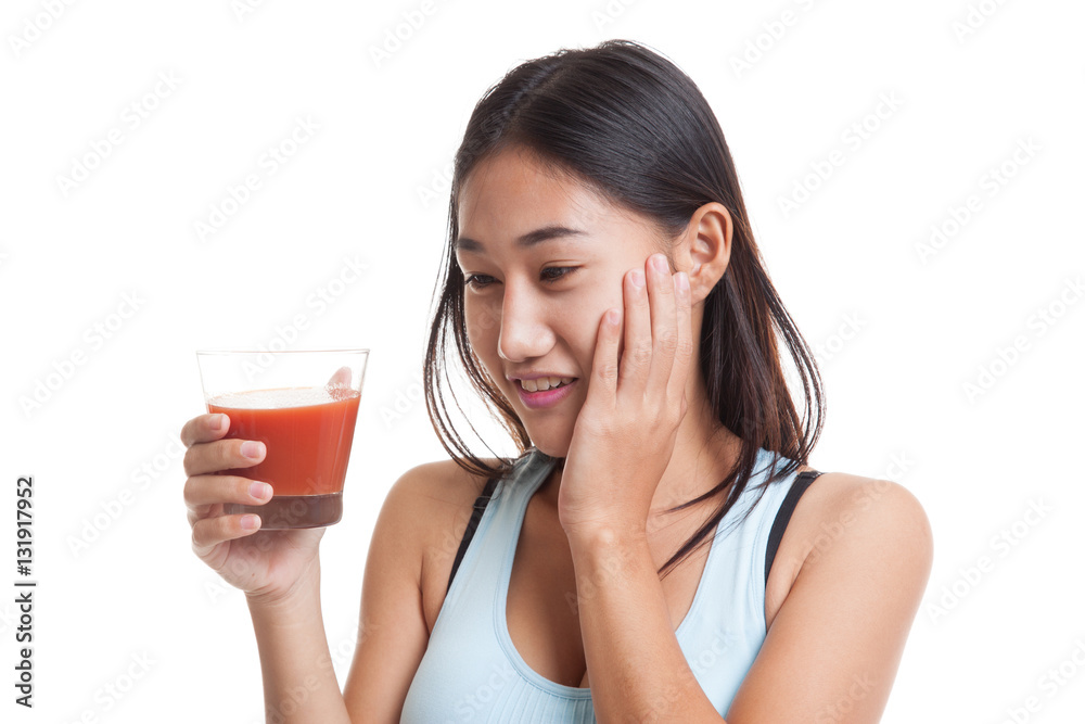 Beautiful healthy Asian girl like tomato juice. Beautiful healthy Asian girl like tomato juice.
