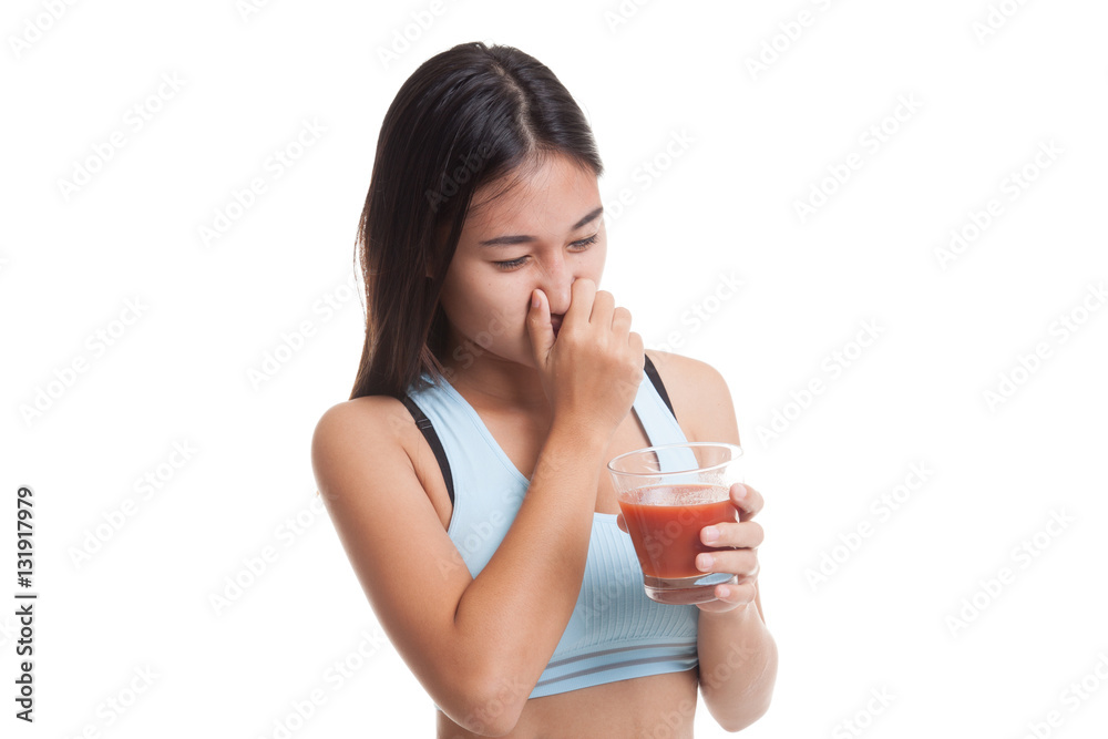 Beautiful healthy Asian girl hate tomato juice. Beautiful healthy Asian girl hate tomato juice.