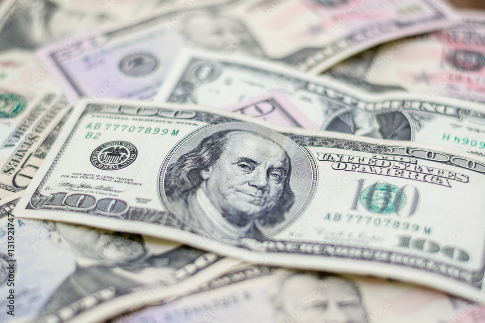 Mixed US dollars, a lot of money background. Finance, business Mixed US dollars, a lot of money background. Finance, business