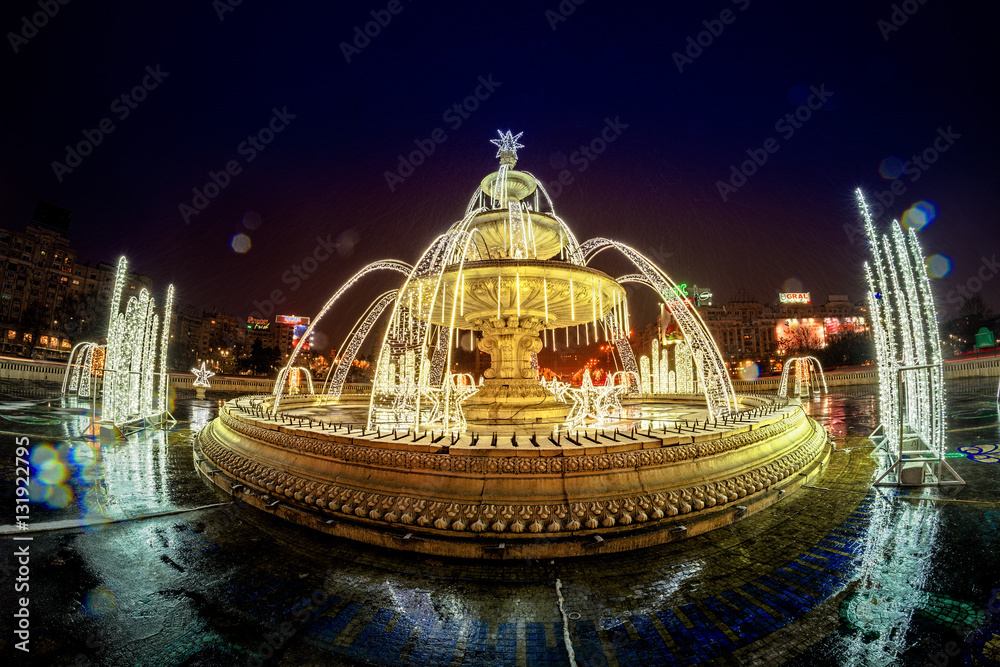 Fototapeta premium BUCHAREST, ROMANIA - DECEMBER 30, 2016: Union Square Fountain An