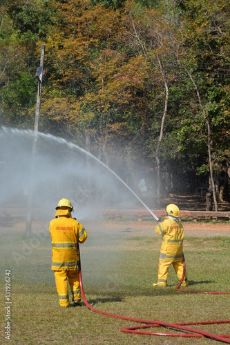 the firefighter are in demonstrative to the fire