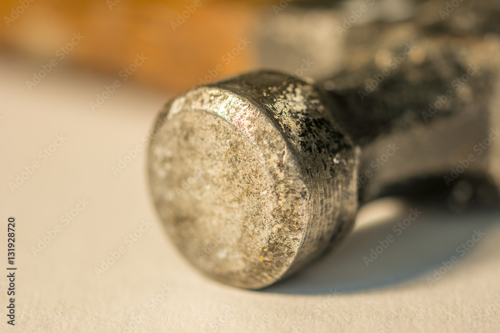 Close up of flat head hammer with blurred background Close up of flat head hammer with blurred background