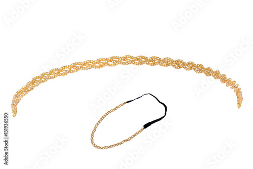 Curved golden metallic headband made of multiple weaved golden fibers, fashion item isolated on white background