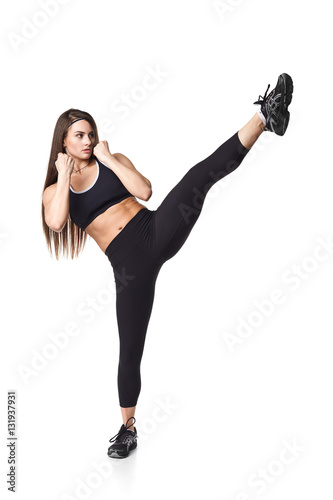 Athletic fitness woman helthy sport isolated white background black clothes fight