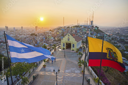 View of the Santa Ana chapel and the city of Guayaquil, from the top of the lighthouse on the Santa Ana hill. Late afternoon. Guayaquil, Ecuador. photo