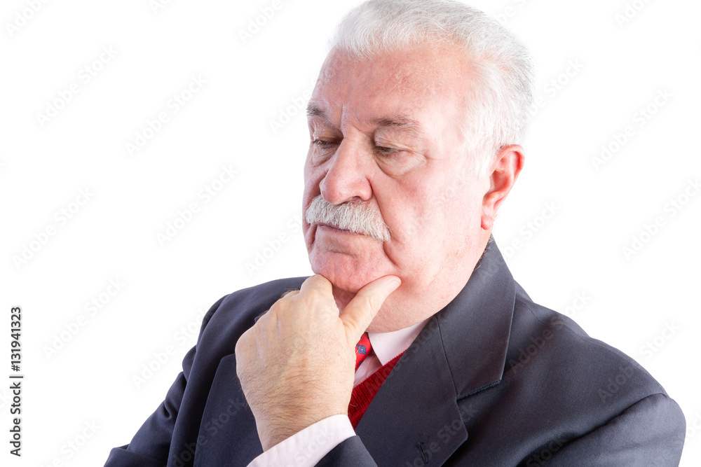 Serious thoughtful mature businessman Serious thoughtful mature businessman