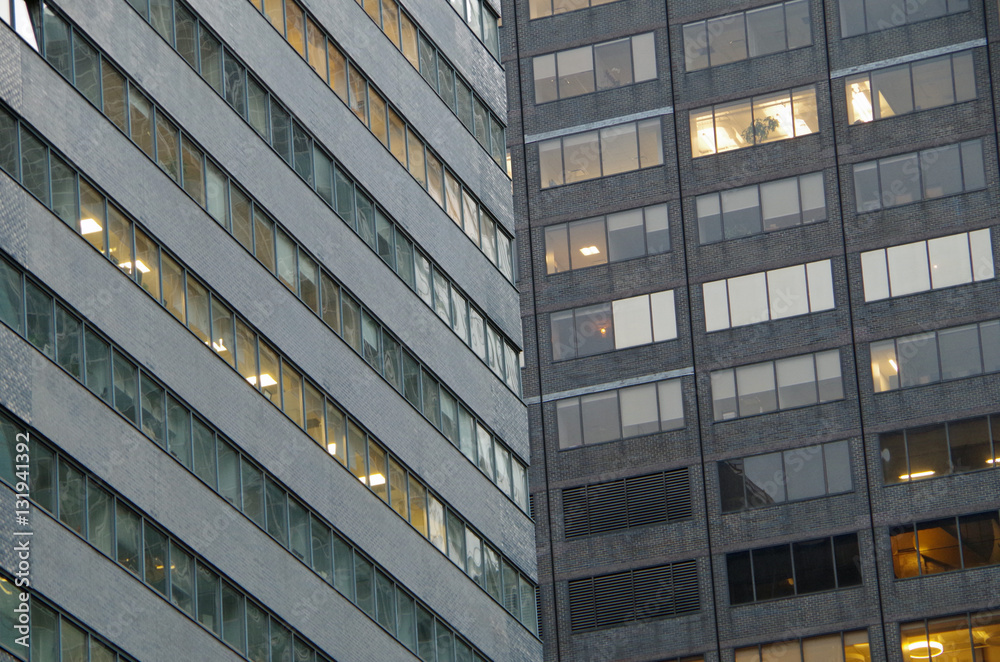 Obraz premium Midtown Manhattan NYC intersecting high-rise buildings architectural background