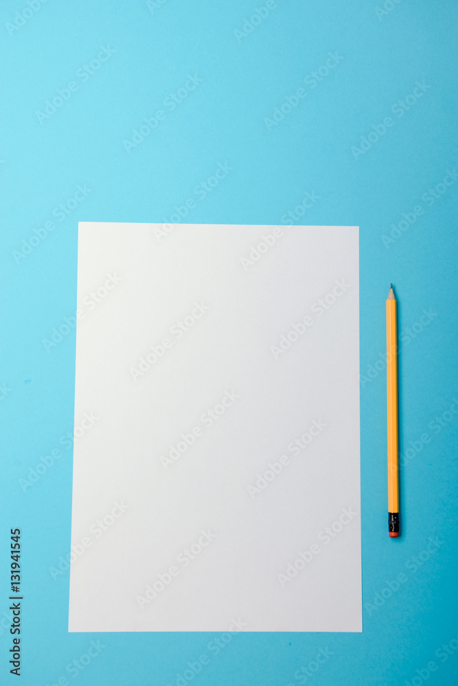 Blank paper and yellow pencils Blank paper and yellow pencils