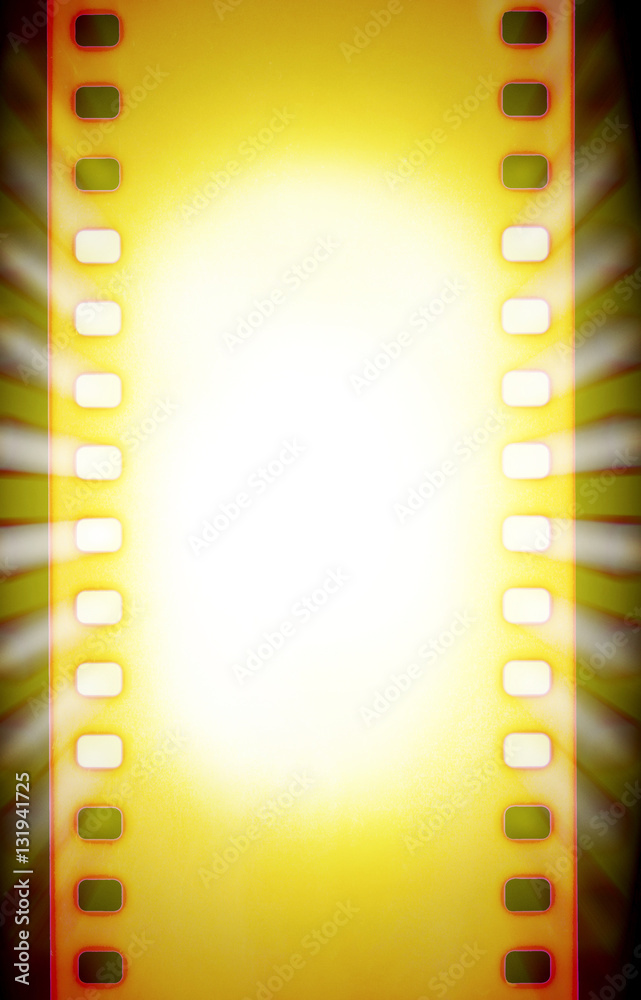 Naklejka premium Cinema film strips and projector light rays.