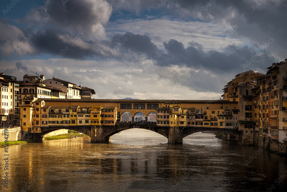 Spanning the Arno River, Florence, Italy's iconic Ponte Vecchio bridge