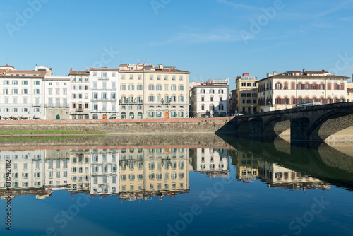 View of Arno river embankment with architecture and buildings a