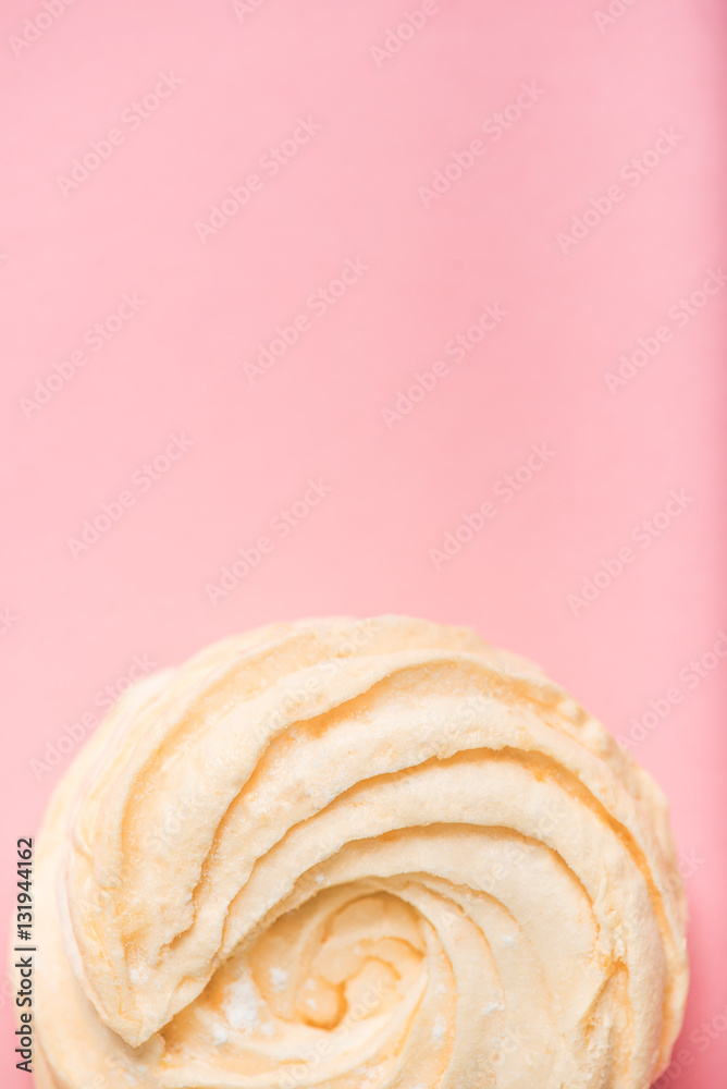 Fototapeta premium Bright orange zephyr at pink background