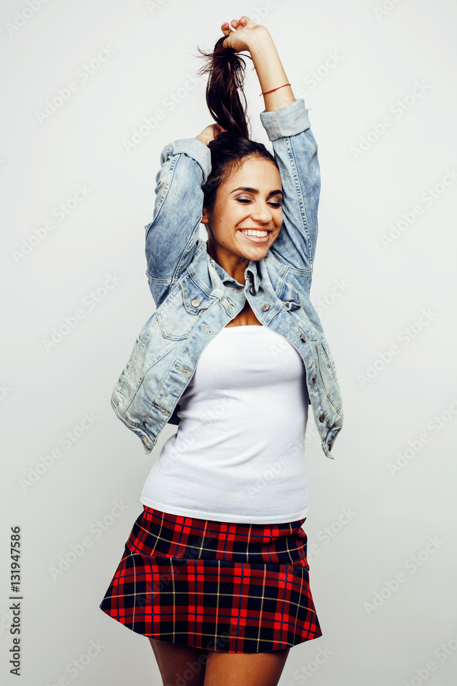 young happy smiling latin american teenage girl emotional posing on