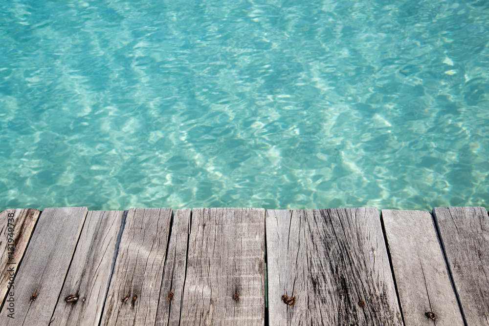 wooden floor and transparent water