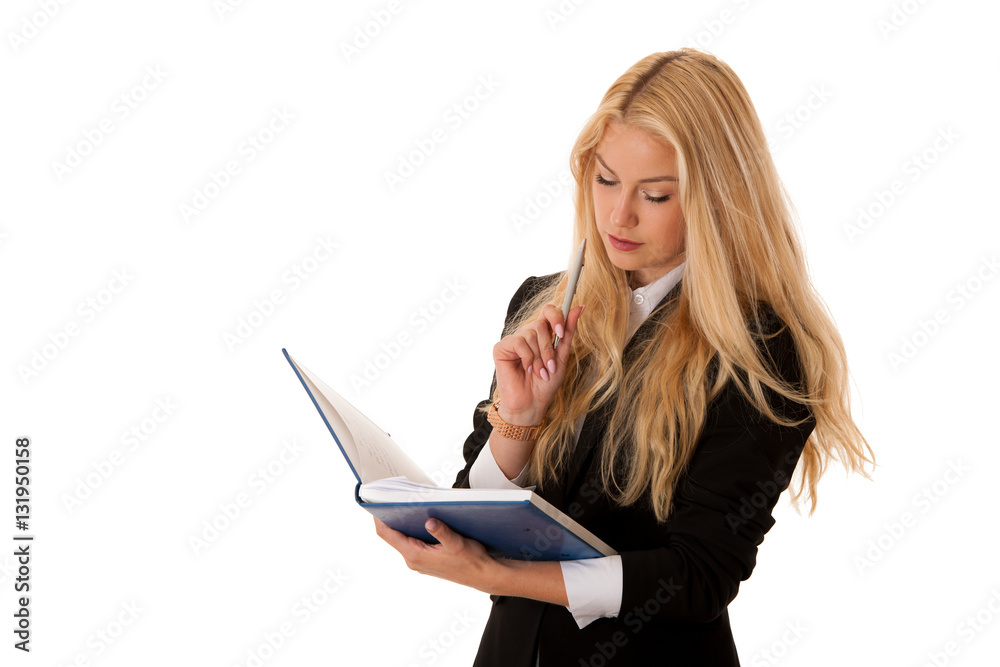Fototapeta premium business woman writing notes in her notebook isolated over white