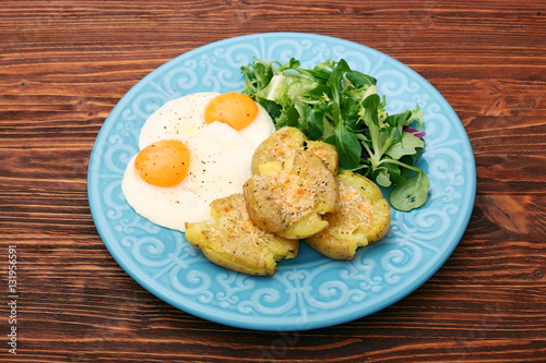 Crispy smashed potatoes breakfast. Healthy lifestyle concept.