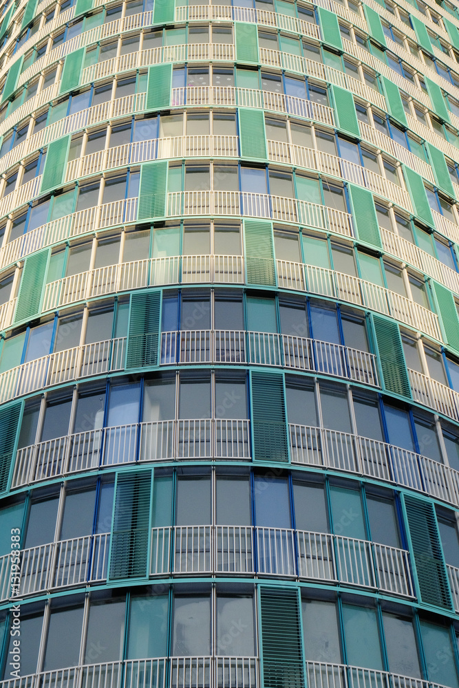 glazed facade of a modern apartment building