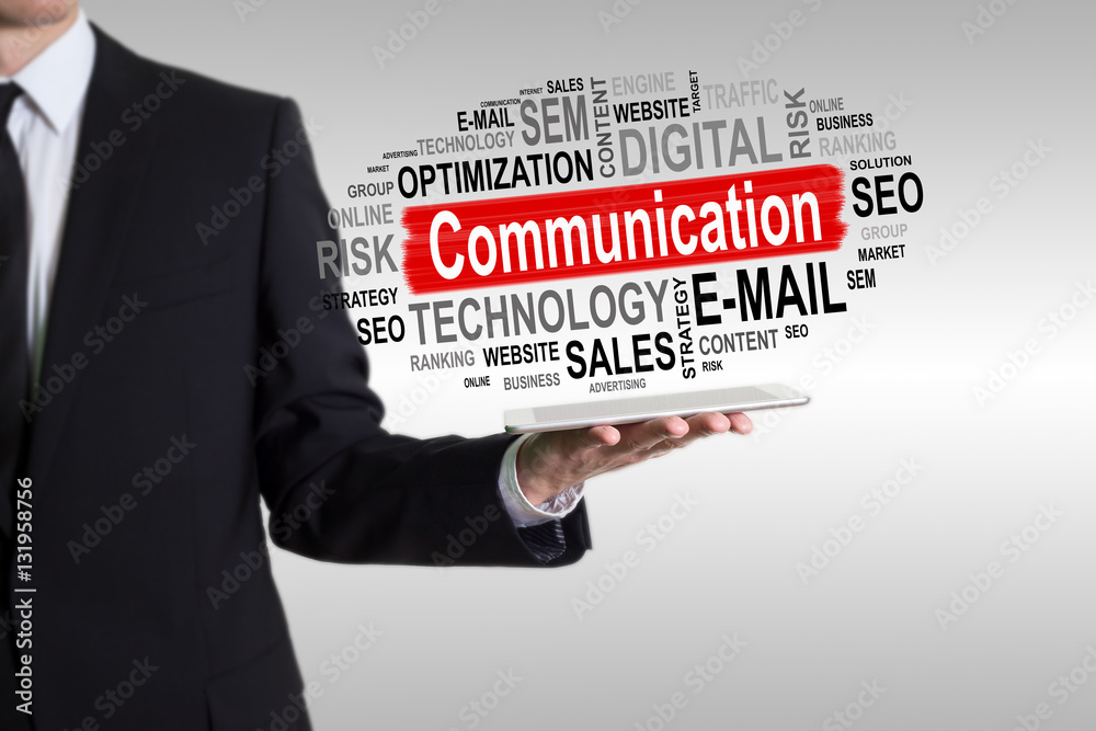 Communication concept. Man holding a tablet computer. Communication concept. Man holding a tablet computer.