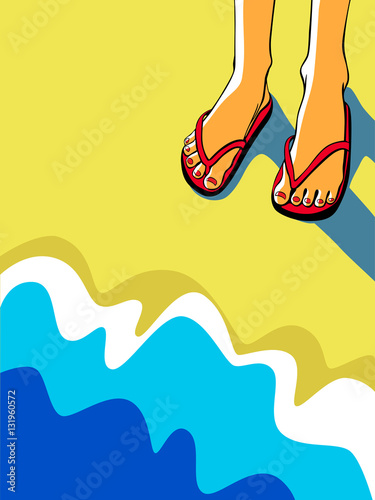 Feet on a sandy beach near the sea.