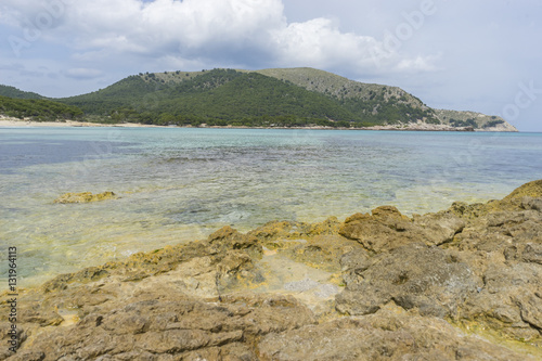 Fototapeta Naklejka Na Ścianę i Meble -  Holiday, Rocks by the sea with waves of the Mediterranean sea ne