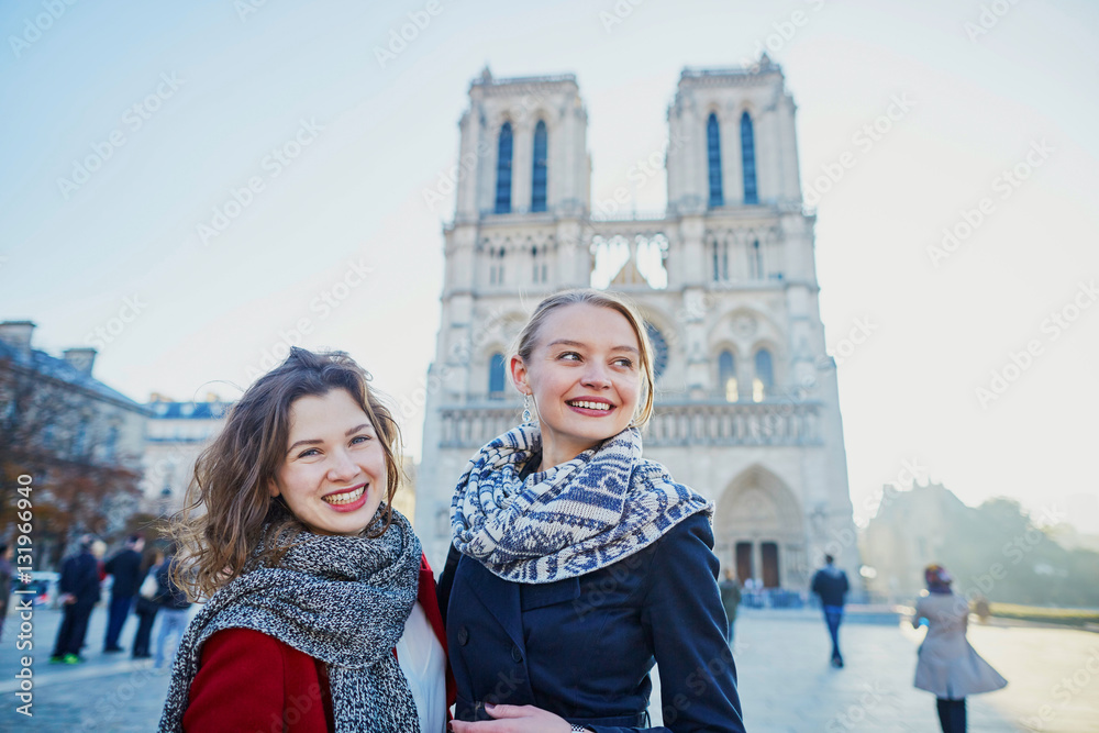 Two young girls near Notre-Dame in Paris