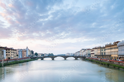 Arno River with Ponte alla Carraia in twilight