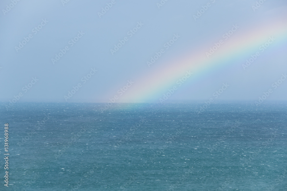 The rainbow above the ocean