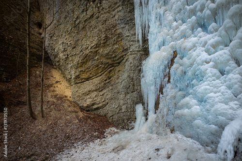 Frozen waterfall in cold winter