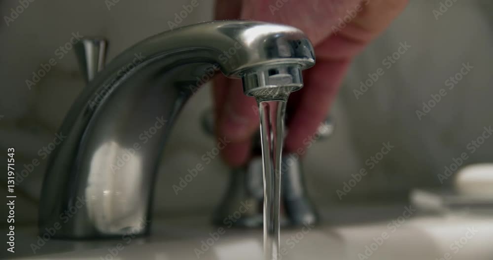 Hotel faucet in slowmotion Hotel faucet in slowmotion