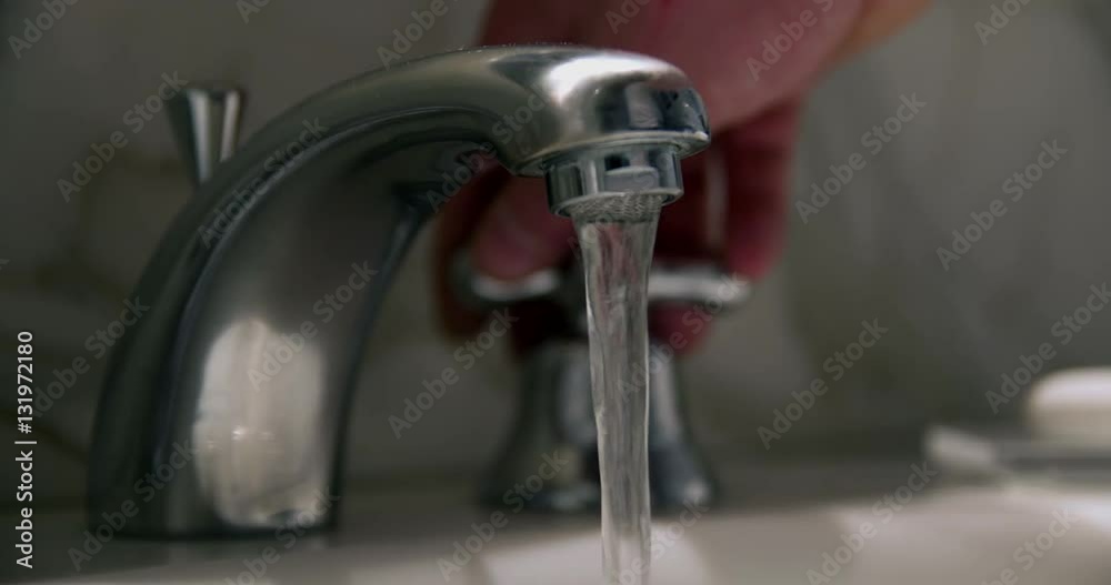 Hotel faucet in slowmotion Hotel faucet in slowmotion