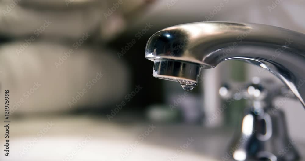 Hotel faucet in slowmotion Hotel faucet in slowmotion