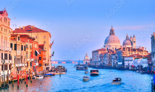 Santa Maria cathedral illuminated at sunset light near the famous Grand Canal, in Venice, Italy